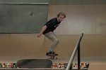 Skateboarder backflips down 6 Stairs