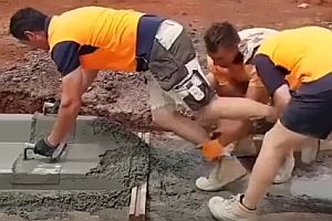 Teamwork beim Straßenbau